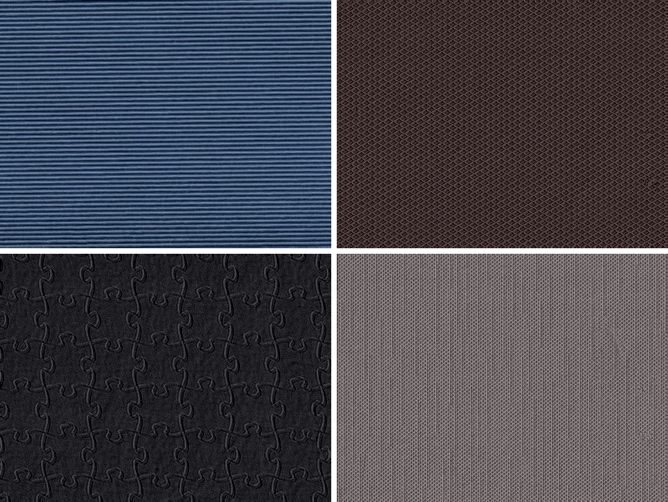 Four engraved patterns on four board colours: birch line on blue, crystal on dark brown, jigsaw on black, linen on lilac grey