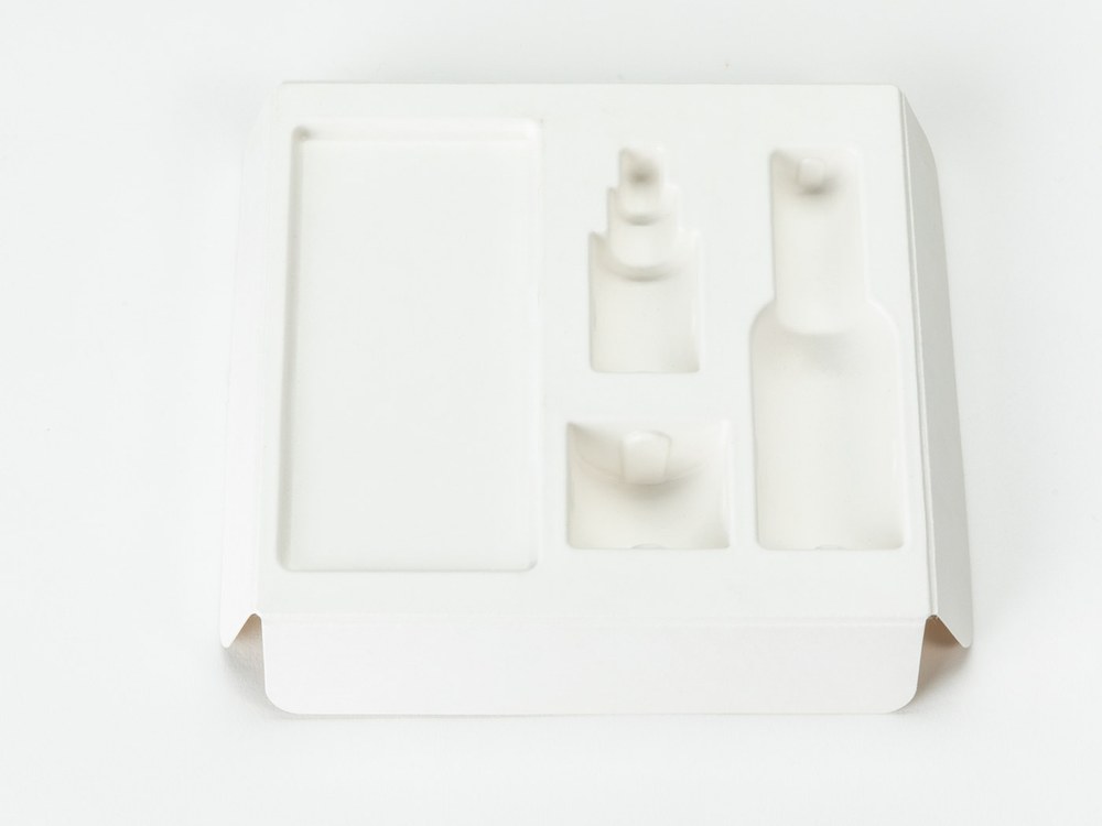 Paper pulp insert